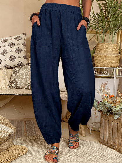 Polyester harem pants with elastic waist, pockets, and machine washable. Suitable for all seasons and plus size.