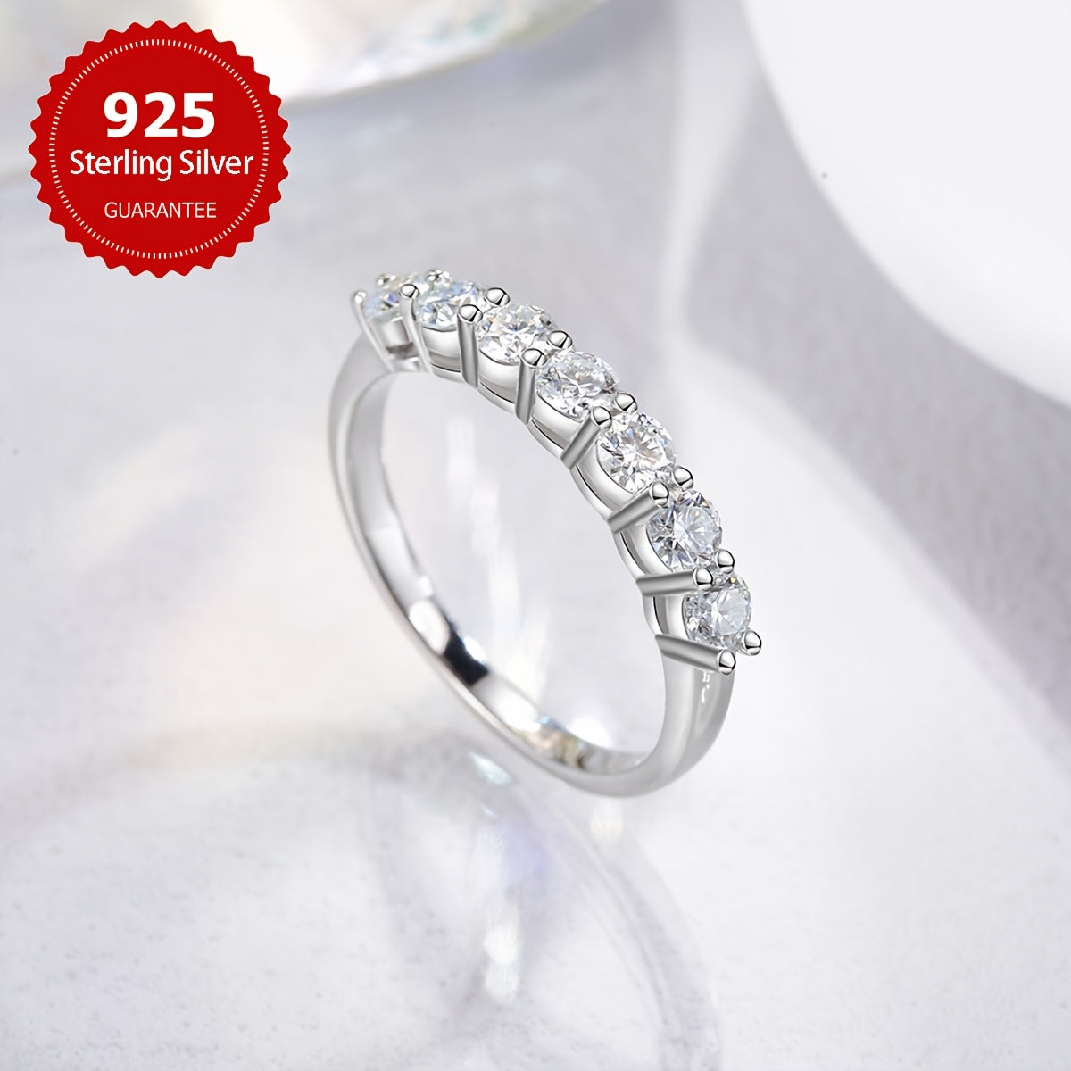 This exquisite Moissanite stone ring features 7 stunning stones set in 925 sterling silver, specifically designed for women. It can be used as an engagement ring, an eternal ring, a promise ring, or a luxurious anniversary gift. The total weight of the