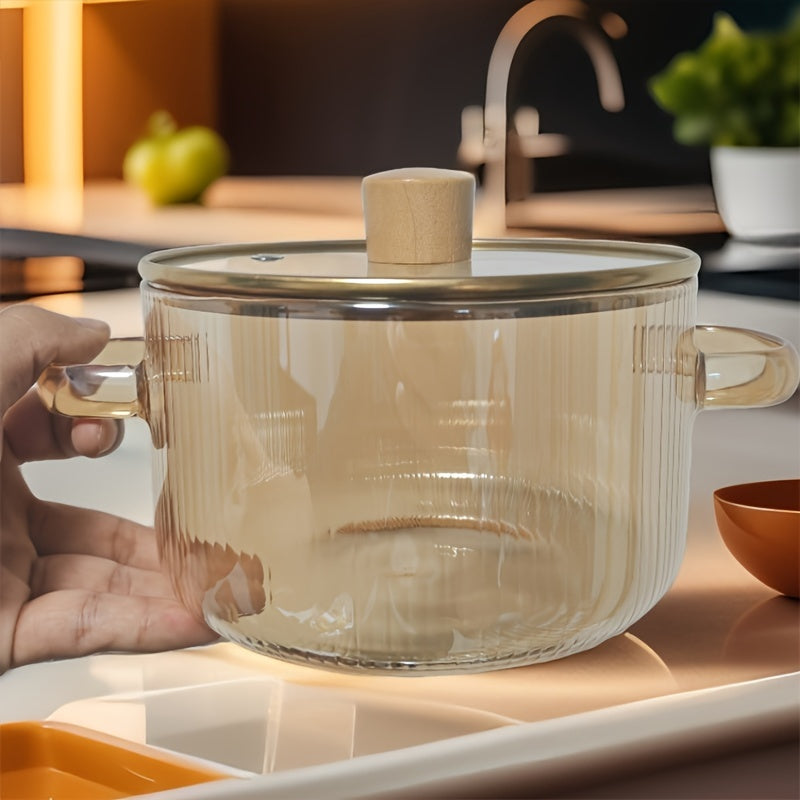 Glass saucepan with a lid, 1550ml capacity, made of clear high-temperature resistant glass. Suitable for stovetop cooking, dishwasher safe, and microwave compatible. Features a double handle and flat bottom, perfect for making soup, noodles, and stews.