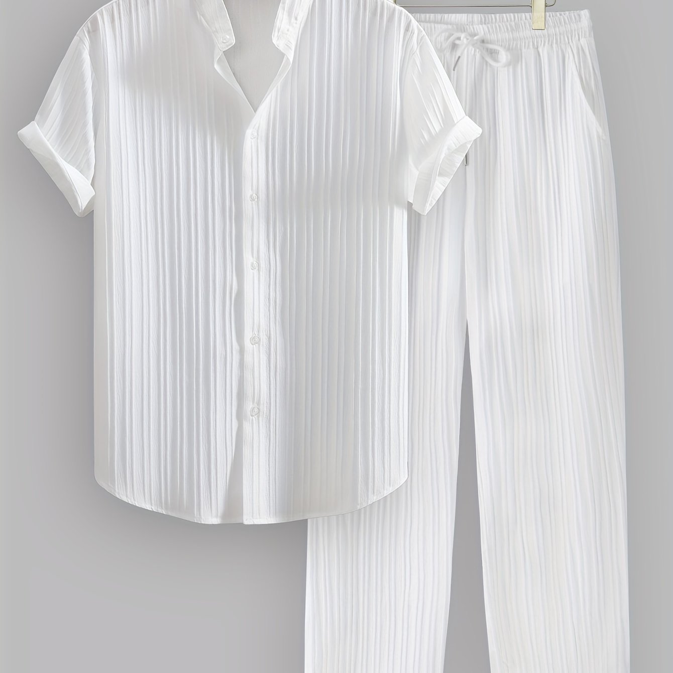 Two-piece men's summer outfit set includes a short sleeve stand collar shirt and drawstring pants in non-stretch woven fabric. Regular fit perfect for daily wear and beach vacation.