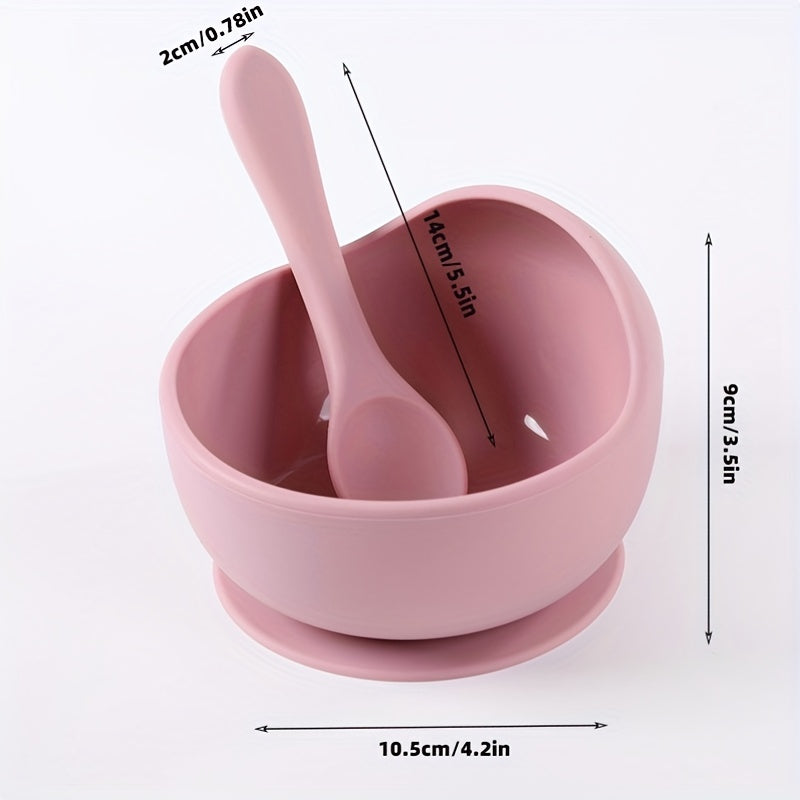 1 set of 2 pieces silicone bowl and spoon for children, featuring a suction cup for anti-slip use. This set is perfect for serving complementary foods and training little ones to eat independently. The set also includes a silicone straw for added