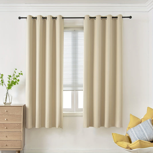 Blackout curtains are an essential addition to any bedroom or living room. These solid black curtains are designed to block out sunlight and provide privacy. The thermal drapes feature grommets for easy installation.