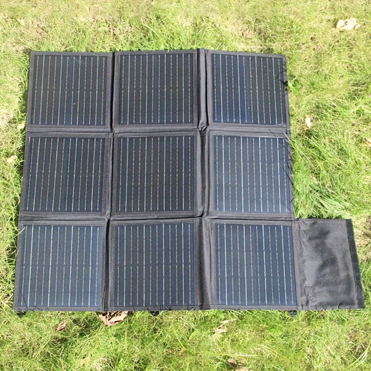 Portable 100W solar panel kit is foldable and suitable for charging laptops and phones outdoors, including USB, Type-C PD, and DC output options. Ideal for camping.