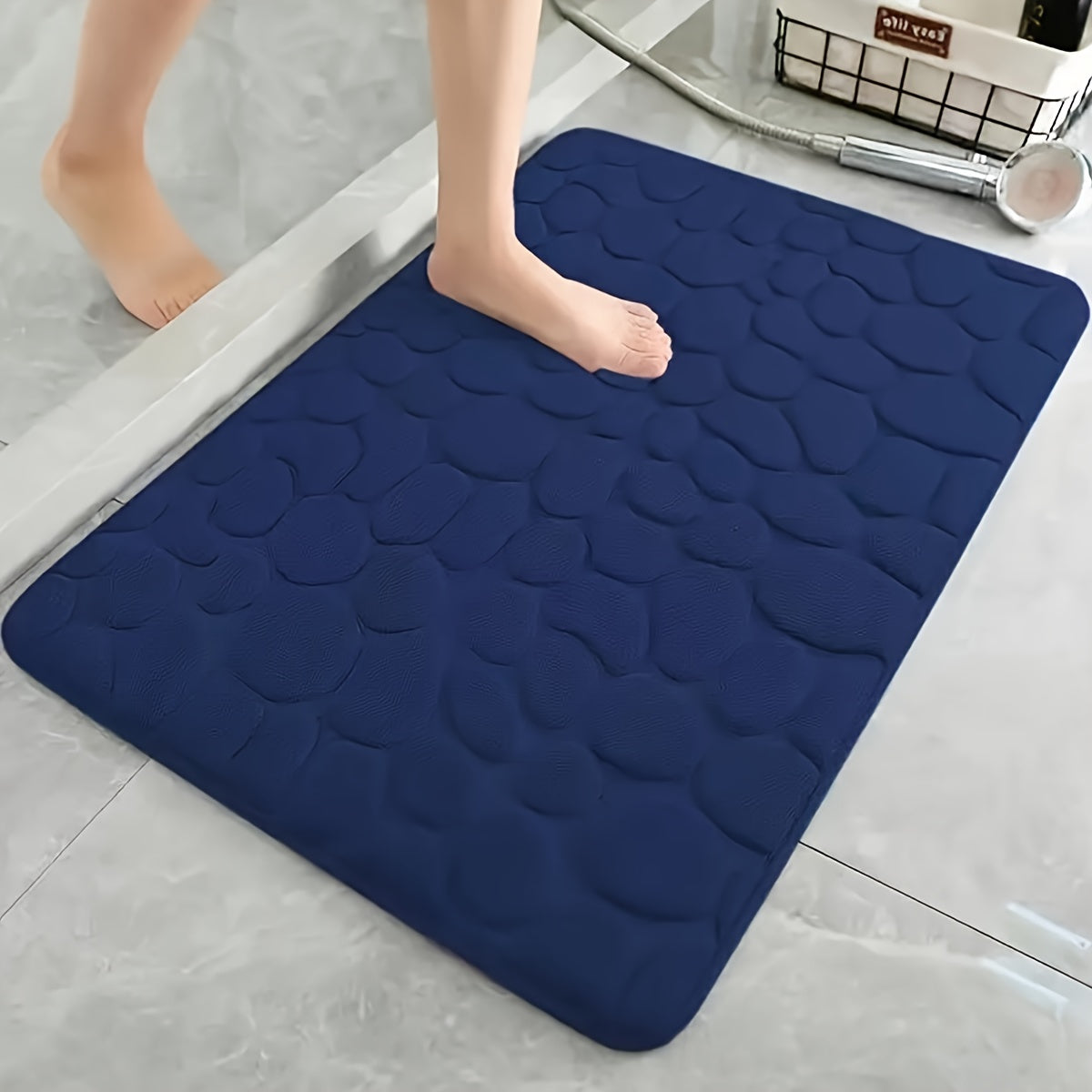 Pamper Your Feet with our Luxurious 3D Pebble Design Bath Rug! This Quick-Dry Non-Slip Bathroom Mat is made of Soft and Comfortable Polyester Memory Foam. It is Woven with a density of 700gsm and is 1.5cm Thick. Perfect for Home Decor and as Holiday