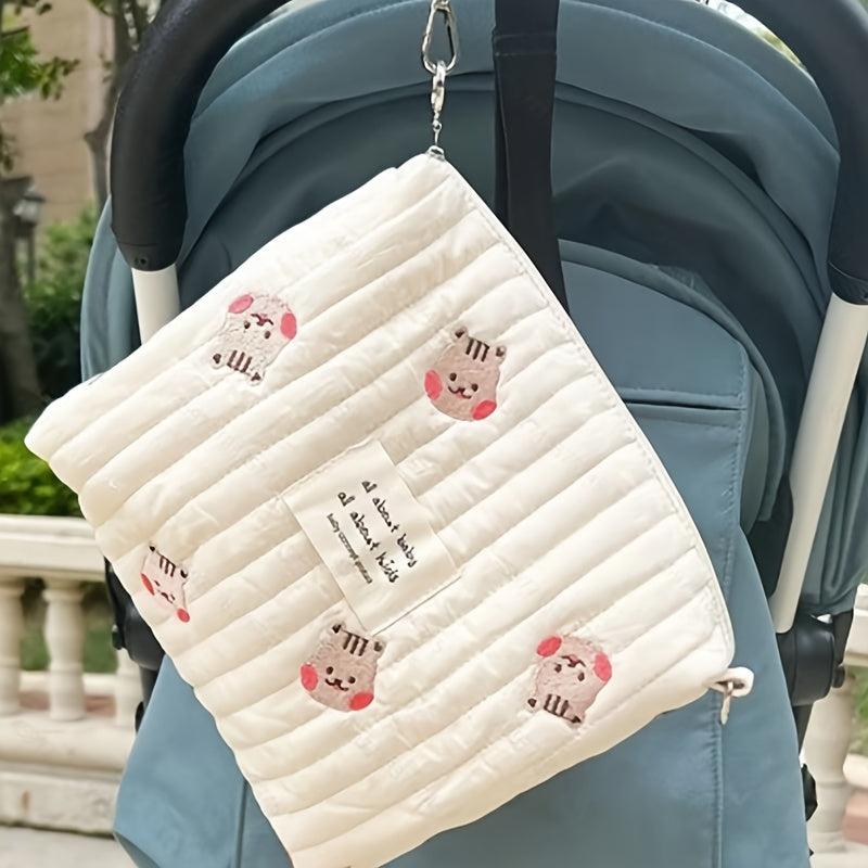 Embroidered Cotton Mommy Bag with Zipper Closure for Stroller Hanging, suitable for Diaper Bag use.