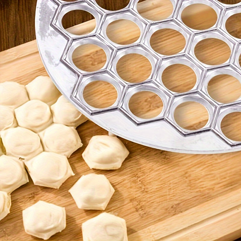 Convenient aluminum dumpling maker with 37 holes for making meat dumplings and other pastries at home. A must-have kitchen tool.