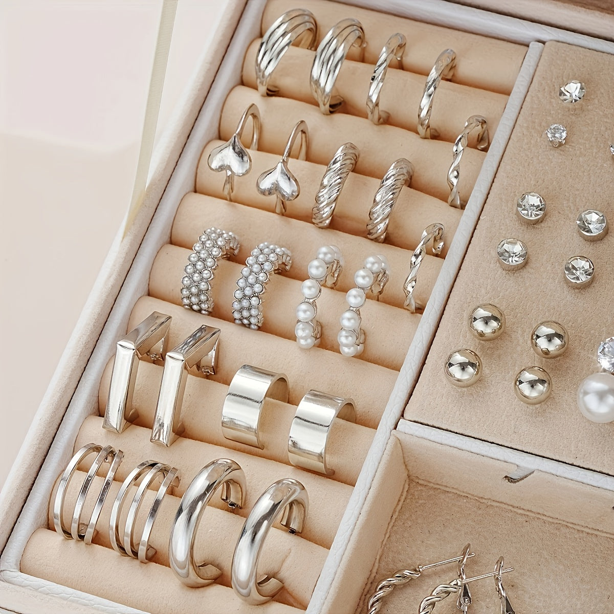 102-piece jewelry set for women with an elegant and simple design. Features rhinestone and faux pearl metal stud earrings. Perfect gift for family, friends, or girlfriend. Versatile for all seasons with a vintage and minimalist style. (Box not included)