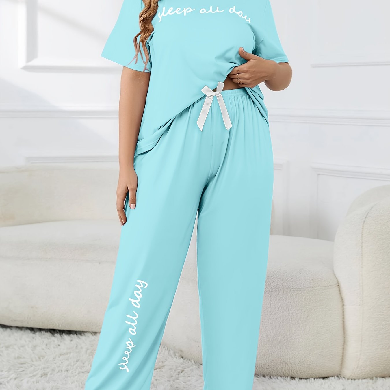 Cute plus-size pajama set with printed top and casual pants.