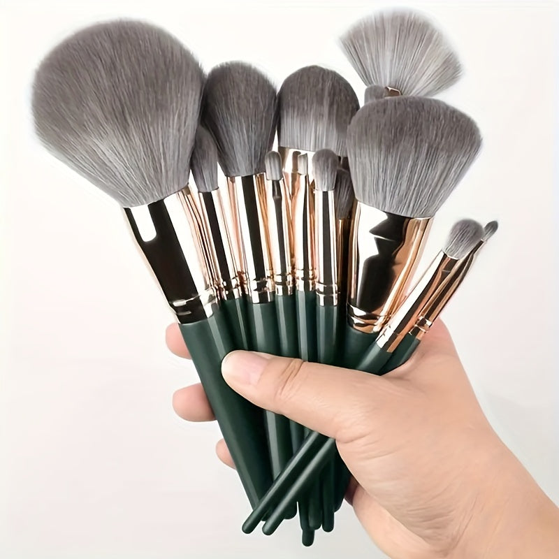 14-piece professional makeup brush set with soft and fluffy silvery/green synthetic hair, ideal for foundation, eyeshadow, eyebrow, and eyeliner application.