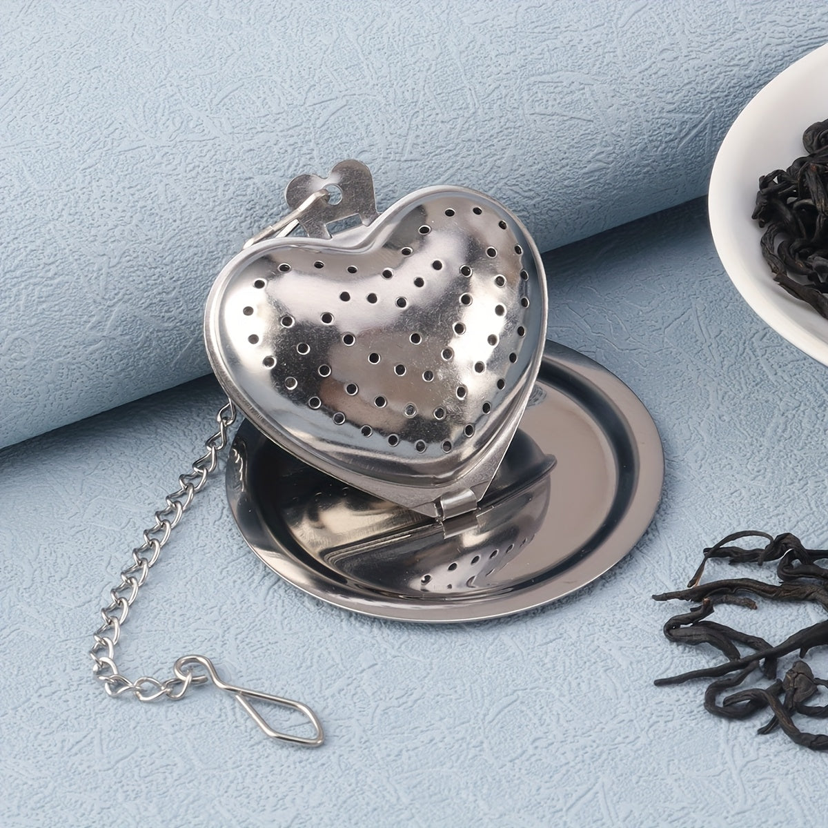 Set of 1 Stainless Steel Hanging Cup Filter Tea Ball with Tray, Available in Heart, Star, and Moon Shapes. Perfect for Ramadan Tea Time. These Creative Tea Balls in Various Shapes are Ideal for Office, Kitchen, Baking, and Special Occasions like Ramadan