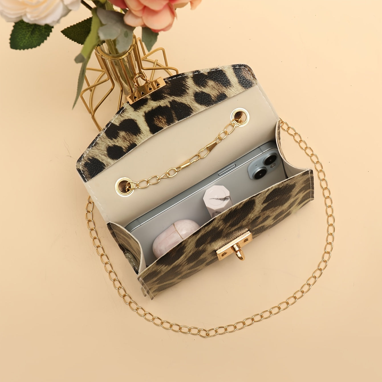 Furry chain crossbody bag with wrist lock and animal print, perfect for daily outings in autumn and winter.