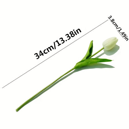 10 elegant white tulip artificial flowers with green leaves are perfect for weddings, engagements, and home decor. Made of durable polyurethane, no batteries needed.