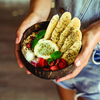 one set of 4: two coconut bowls, two wooden spoons, ideal for healthy vegetarian salads and ice cream, made from natural coconut.