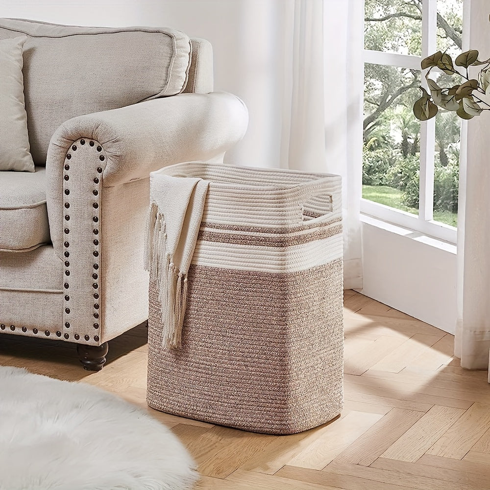 This large cotton rope laundry basket with handles is perfect for storing clothes and blankets in style. It's ideal for organizing your living room or bedroom and is suitable for ages 14 and up. Made of durable cotton material, this decorative woven