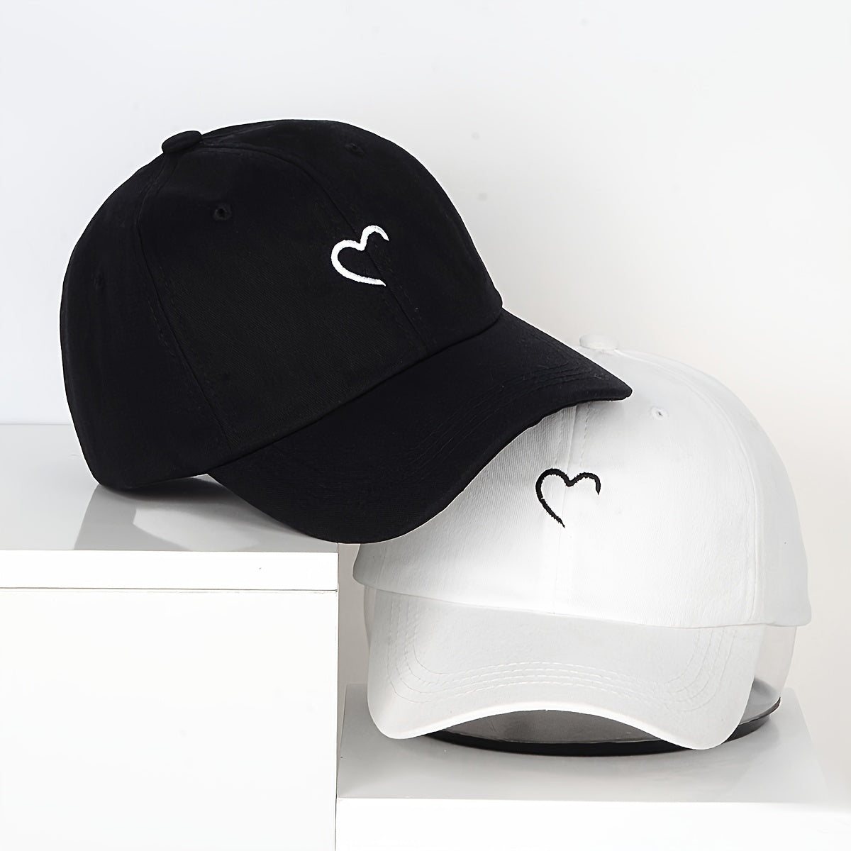 Women's adjustable baseball cap with embroidered heart - great for everyday and special events.