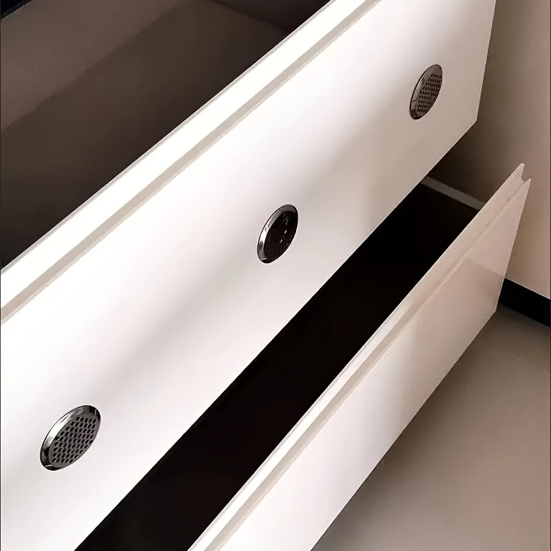 A set of 5 stainless steel circular shoe cabinet vents with flat breathable holes, designed for ventilation and heat dissipation. These golden home accessories also include covers for the ventilation holes.