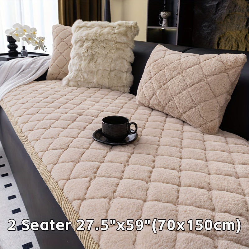 Modern quilted sofa cover, pet-friendly, machine washable, non-slip, thick polyester protector for various furniture sizes and styles in home or office décor.