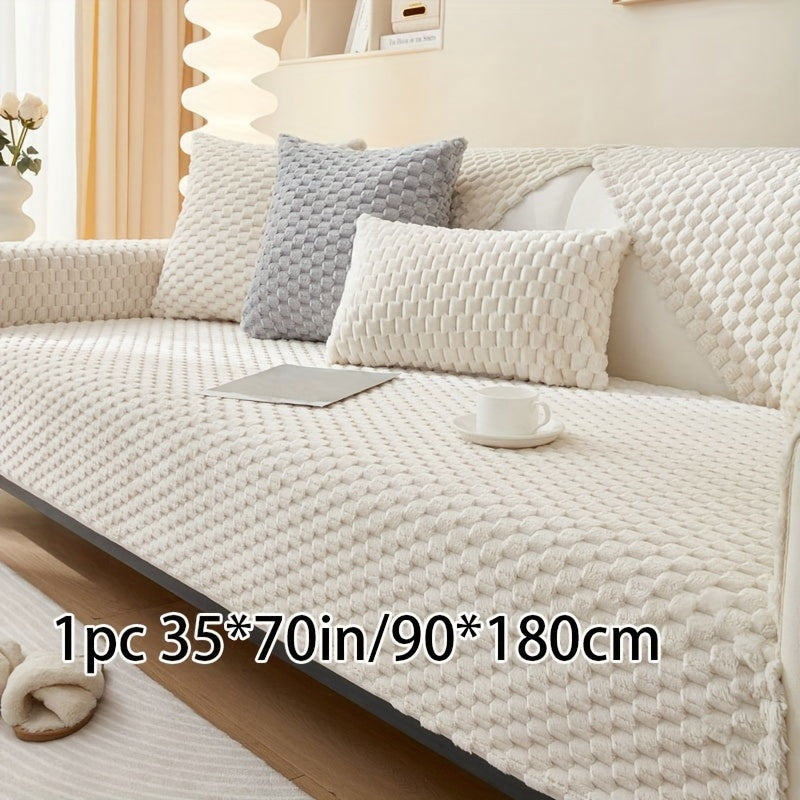 Non-slip sofa cover with honeycomb pattern, ideal for all seasons and protecting furniture in any room.