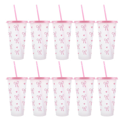 BPA-Free plastic water cups with lids and straws in heart and bow print. Leak-proof and reusable for outdoor events. Great for gifts on special occasions.