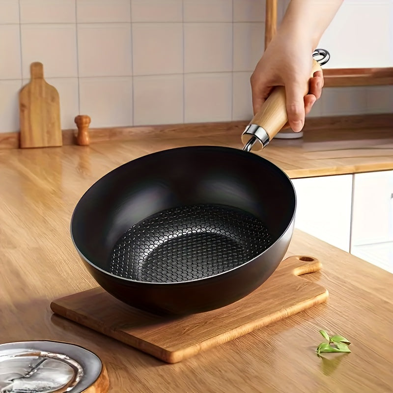 Single serving traditional Chinese wok made of durable mini cast iron. This 20cm pan is non-stick, retains heat well, and is easy to clean. Suitable for use on gas and electric stoves.