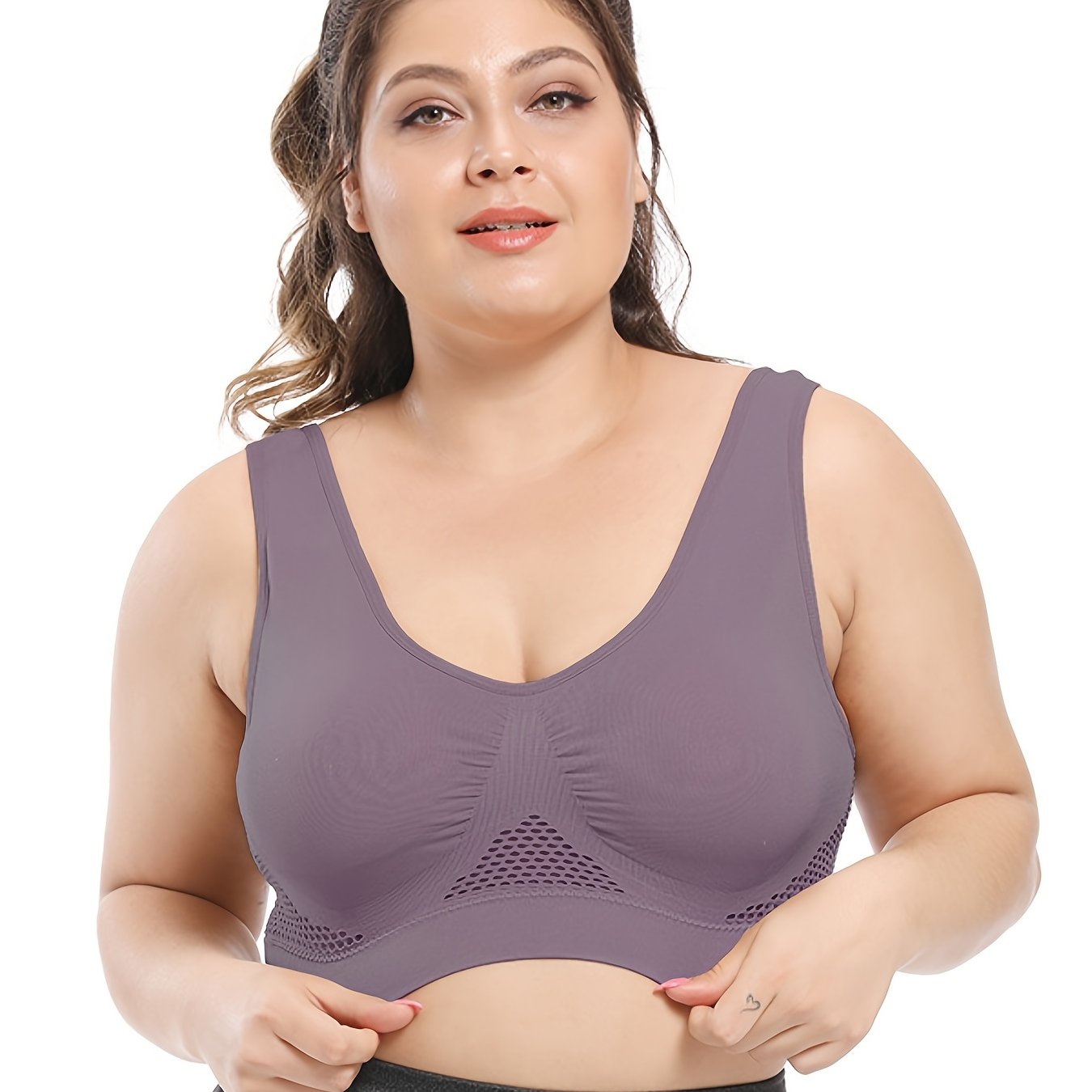 Seamless purple sports bra for plus size women, with breathable mesh fabric, push-up support, removable pads, and comfort fit. Available in sizes 36XL to 40XL.