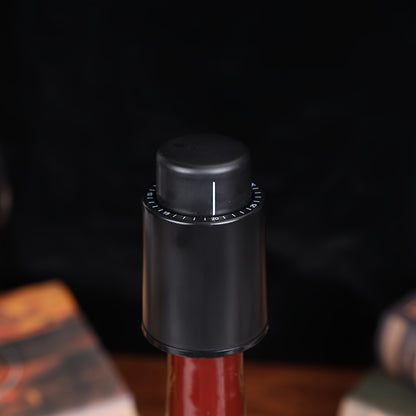 Polypropylene vacuum wine stopper preserves freshness by removing air with one press, keeping red wine bottles fresh and reusable.