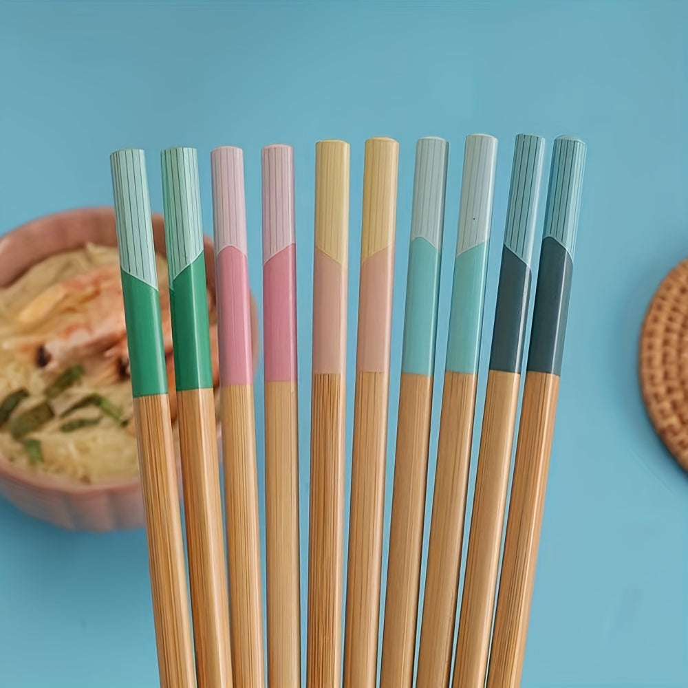 5 pairs of bamboo chopsticks that are antibacterial, anti-mold, anti-slip, carbonized, and high-temperature resistant. They are also reusable, lightweight, dishwasher safe kitchen supplies.