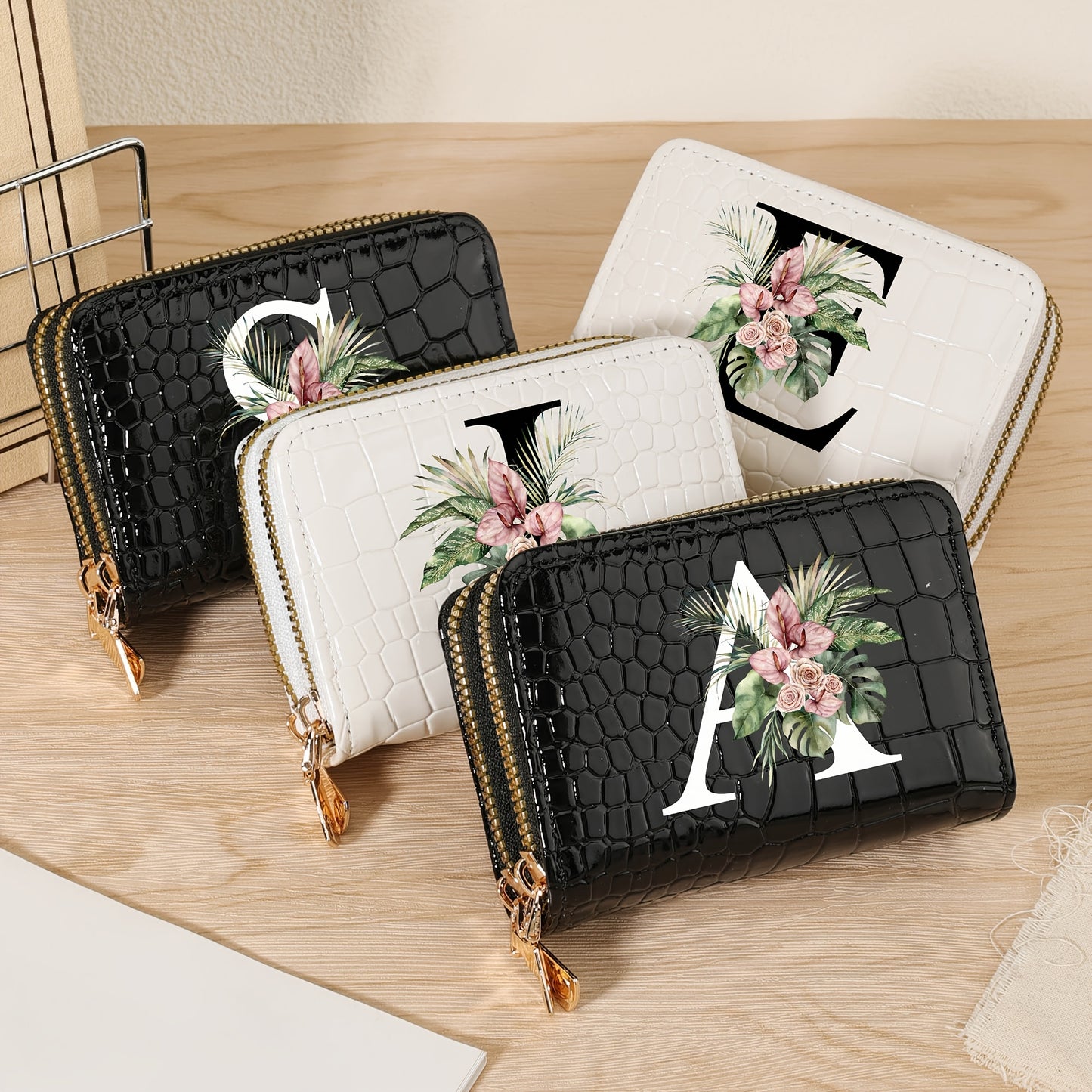 Women's credit card wallet with elegant floral letter print in black & white. Features large capacity, dual zipper, crocodile texture PU, lightweight design with nylon lining for everyday