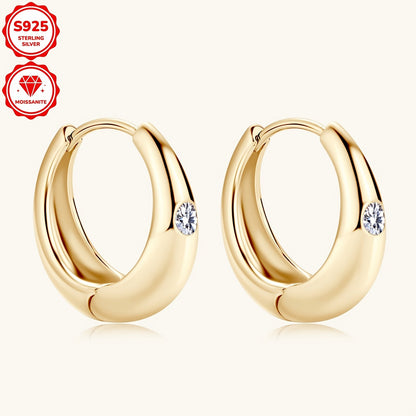 These stylish women's hoop earrings are crafted from 925 sterling silver and adorned with 2.5mm Mozambique stones. The simple yet fashionable design features a circular shape, weighing a total of 4.36g in silvery color. Each earring is embellished with 2