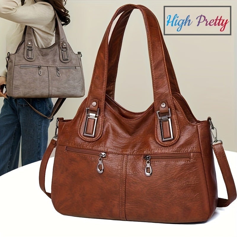 Stylish women's crossbody bag with multiple pockets, detachable strap, chic design, zip closure, and polyester lining.