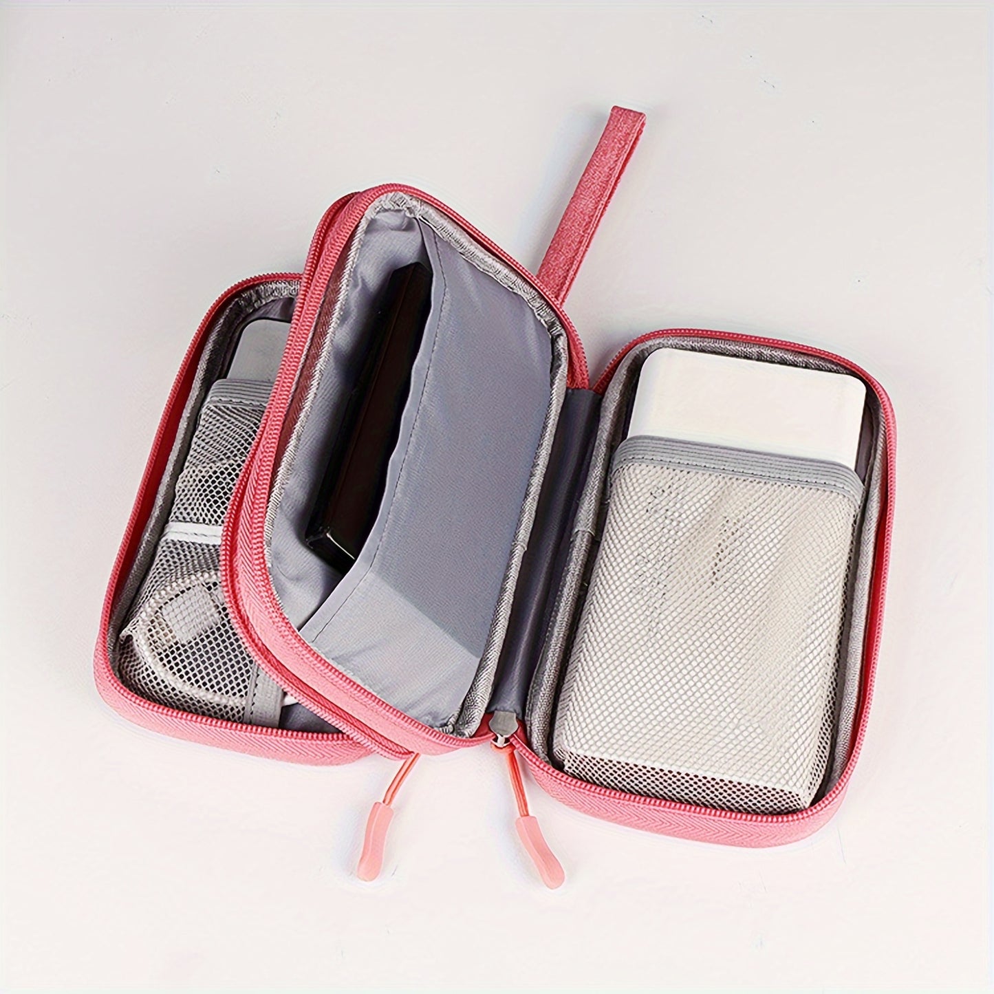 Travel cable organizer for cables, chargers, cell phones, and headphones.