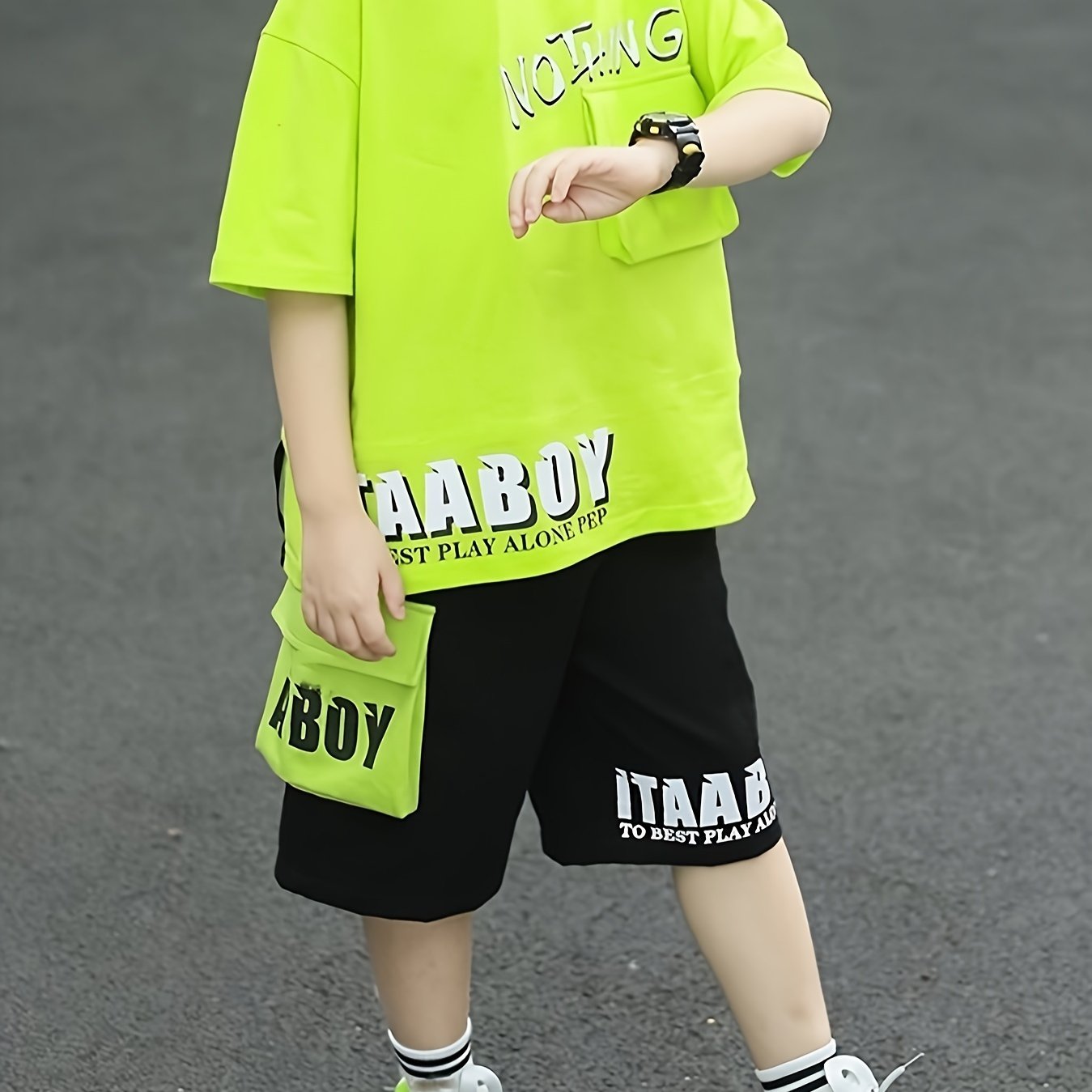 Boys' summer sports outfit with cartoon design, includes top and shorts set for older kids, perfect for outdoor activities.