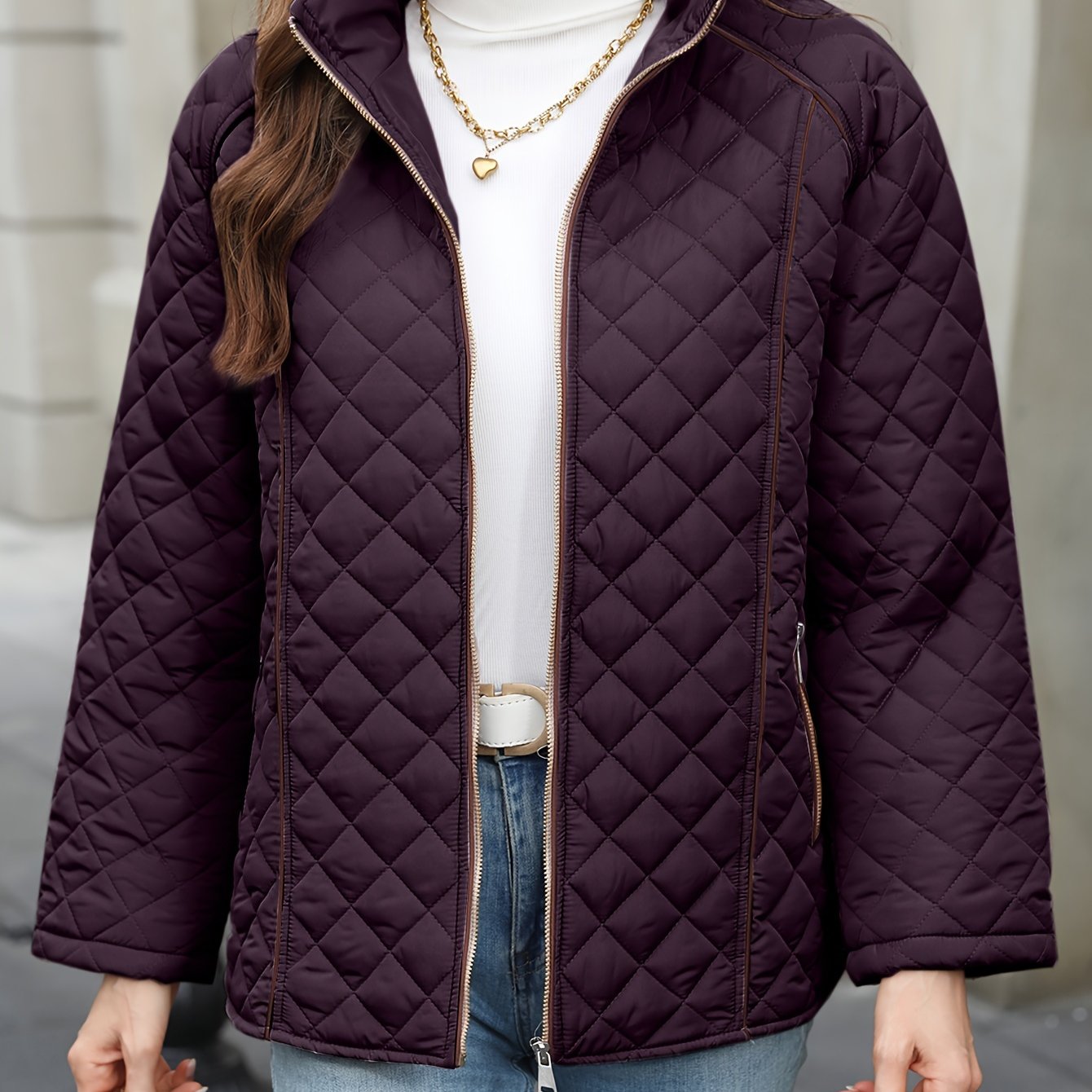 Women's plus size casual quilted outerwear with stand collar, zipper, and long sleeves. Made of 100% non-stretch solid woven polyester for fall/winter.