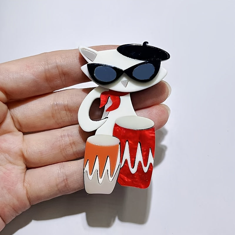 Elegant Cartoon Cat Drummer Brooch Pin, featuring an Acrylic Irregular Shape. This trendy Animal Musician Badge is the perfect Clothing Accessory, suitable for both Men and Women. Elevate your style with this Unisex Fashion Lapel Pin.