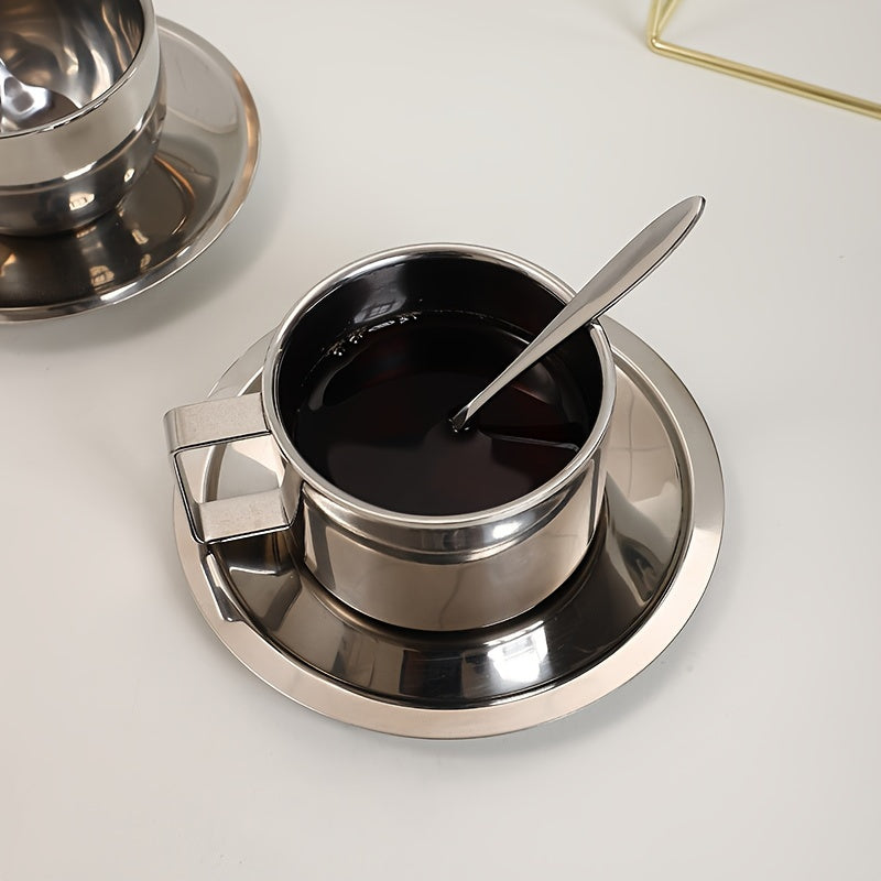 Stainless steel coffee cup and saucer set suitable for home or office, perfect for cappuccinos, lattes, mochas, and tea.