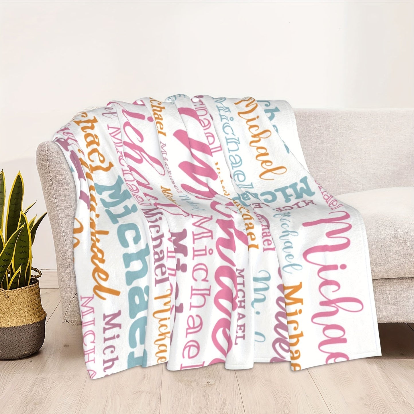 Personalized Big Name Blanket by QOGOER made from an ultra-soft 100% polyester flannel knit fabric, featuring high-quality digital printing in a mixed color design that is suitable for all seasons.