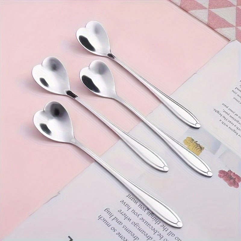 Celebrate love with 2 stainless steel coffee spoons shaped like hearts, the perfect gift for Valentine's Day. These creative spoons are perfect for stirring desserts and are ideal for Christmas parties, holidays, restaurants, and home use.