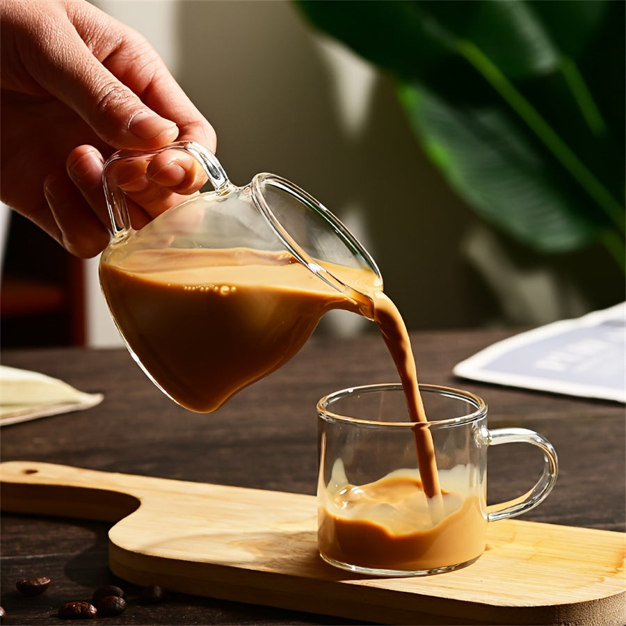 Mini glass pouring jug for coffee and sauces, hand wash only, microwave safe, perfect for family gatherings and Eid Al-Fitr celebrations.