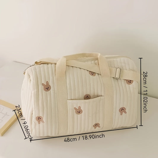 This large, multifunctional diaper and essentials storage handbag features a bear print quilted design. Made of fabric, it comes with a shoulder strap and is suitable for ages 14 and up.