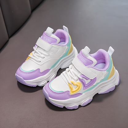 Girls' all-season fashion sneakers with sweet color block design and heart pattern, featuring easy closure, low-top PU upper, and rubber sole in pink and purple options. Perfect for daily