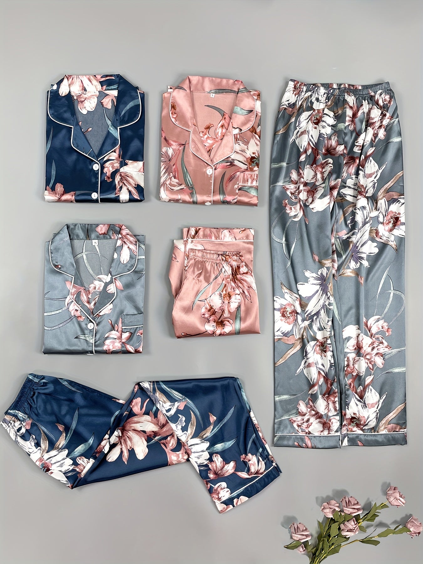 Three sets of six-piece satin pajama sets for women with printed short-sleeved buttoned cardigan tops and elastic waist trousers in a variety of colors.