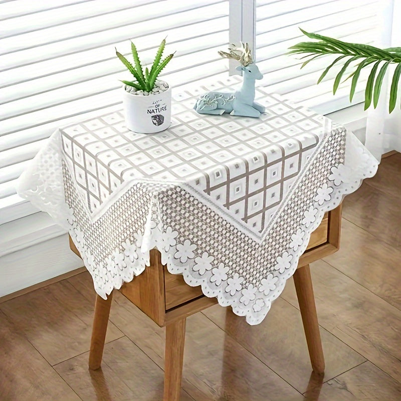 Polyester lace tablecloth for kitchen and dining decor, featuring elegant floral design.