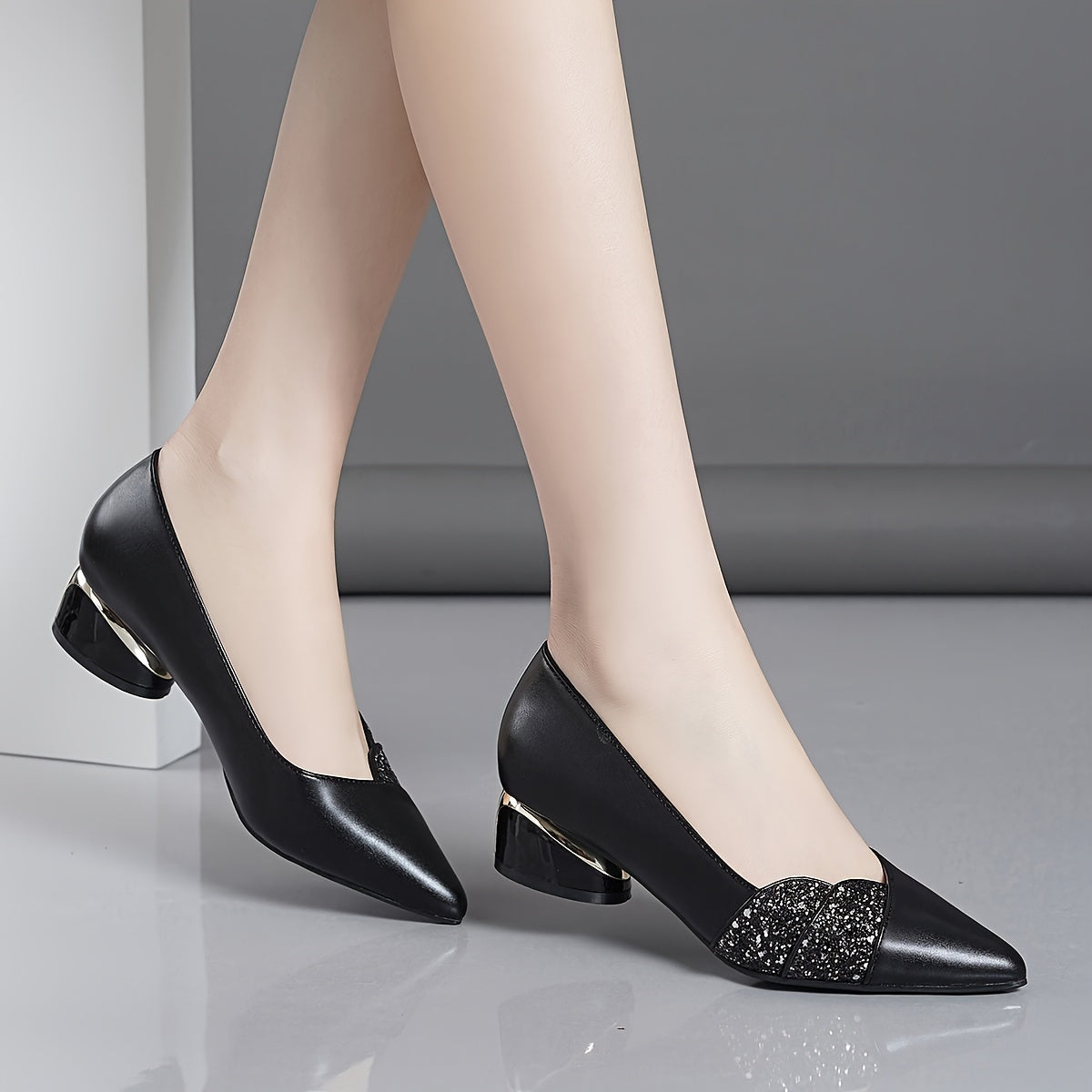 Women's chic pointed-toe pumps with rhinestone detail and comfortable chunky heel, perfect for fall.