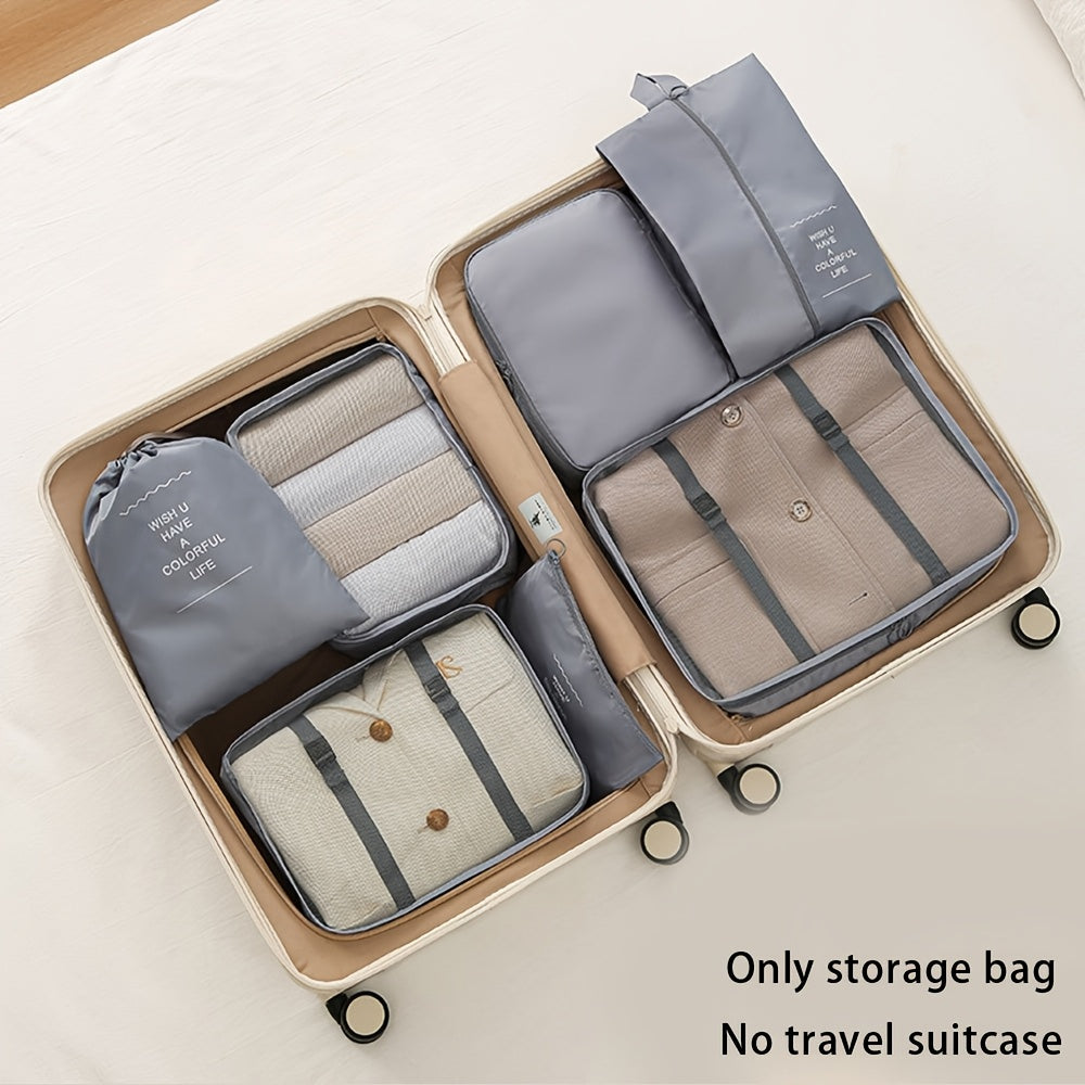 Waterproof travel organizer bag, includes seven pieces for clothes, pants, shoes, and socks.