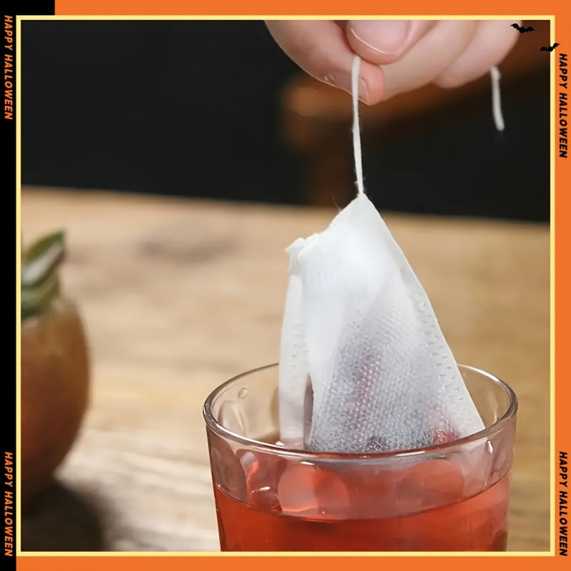 Pack of 100 non-woven tea bags with drawstring, perfect for spices, herbs, and floral teas. Easy to use and made of durable cloth material.