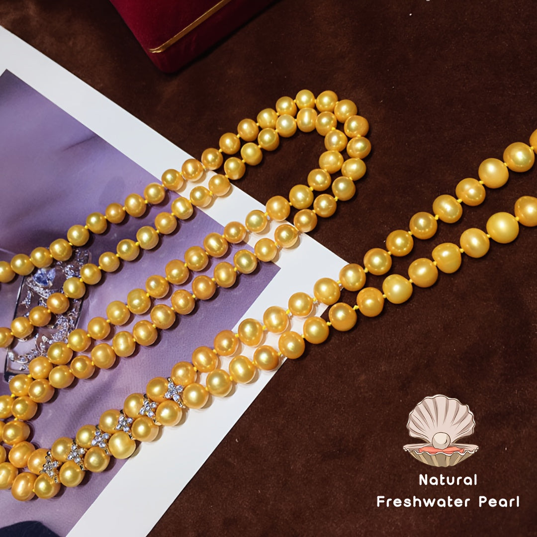 New for the autumn and winter season, this elegant and classic long chain sweater featuring natural freshwater golden pearls is perfect for formal occasions, banquets, or everyday wear. With minor flaws that add to its unique charm, this stunning piece