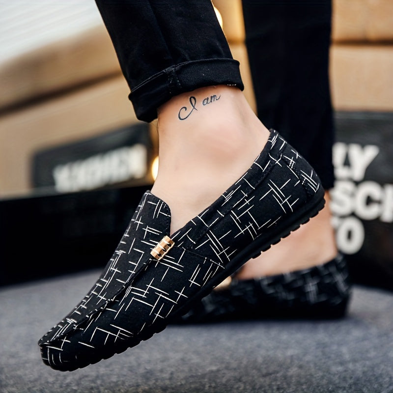 Men's slip-on loafers with stylish black and white geometric pattern, breathable mesh upper, rubber sole, and round toe. Perfect for outdoor wear in all seasons. Durable and comfortable