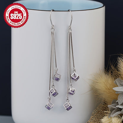 These trendy silver tassel earrings are perfect for those with sensitive skin. The long square design with tassel ear drops adds a chic touch to any outfit and can help to accentuate a slim face. The curved hook earrings are sure to add personality to