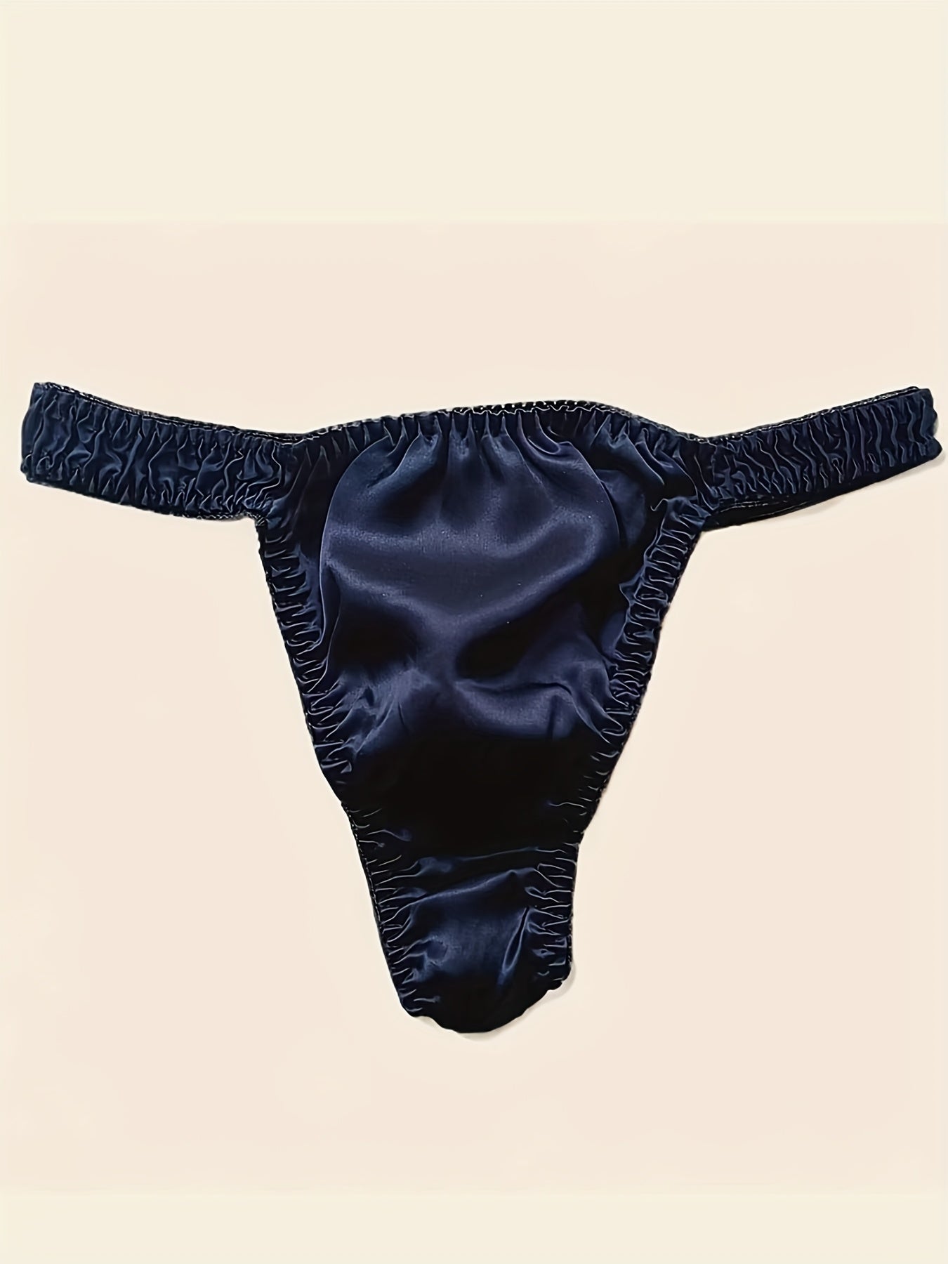 Men's Mulberry Silky Briefs are soft, breathable, non-see-through red underwear with an elastic waistband and ruffled edges. Hand wash only.