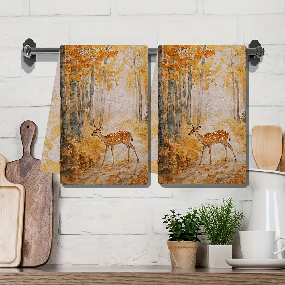 Two pieces of incredibly soft kitchen towels featuring a serene forest and deer scene. These highly absorbent dish hand towels are machine washable and measure 40.64x60.96 cm. Perfect for holiday decor and drying dishes.